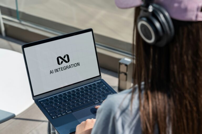 woman on laptop using ai integration